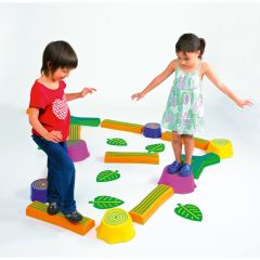 2 children walk on a raised line to practice balancing